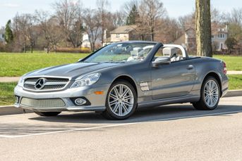 2009 Mercedes-Benz SL600 - 5.5L bi-turbo V12 engine producing 510 hp and 612 lb-ft of torque