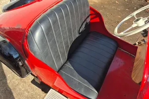 1954 IHLE Schottenring CarConvertible 016 Red and black Black vinyl Kohler 305-cc L-head four-stroke single