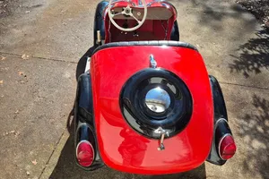 1954 IHLE Schottenring CarConvertible 016 Red and black Black vinyl Kohler 305-cc L-head four-stroke single