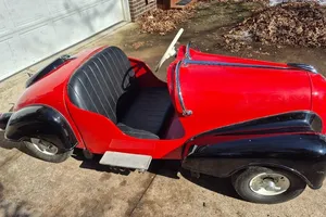 1954 IHLE Schottenring CarConvertible 016 Red and black Black vinyl Kohler 305-cc L-head four-stroke single