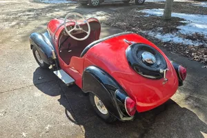 1954 IHLE Schottenring CarConvertible 016 Red and black Black vinyl Kohler 305-cc L-head four-stroke single