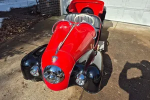 1954 IHLE Schottenring CarConvertible 016 Red and black Black vinyl Kohler 305-cc L-head four-stroke single