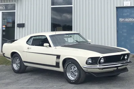 1969 Ford Mustang Boss 302 in Wimbledon White, front three-quarter view