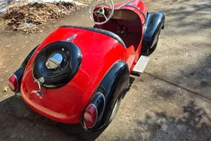 1954 IHLE Schottenring CarConvertible 016 Red and black Black vinyl Kohler 305-cc L-head four-stroke single